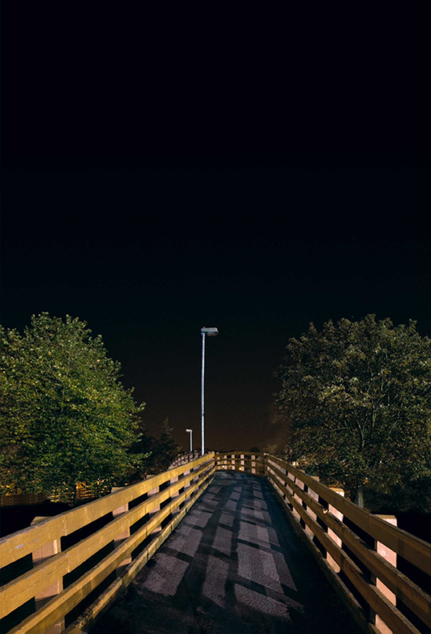 Wooden bridge at night